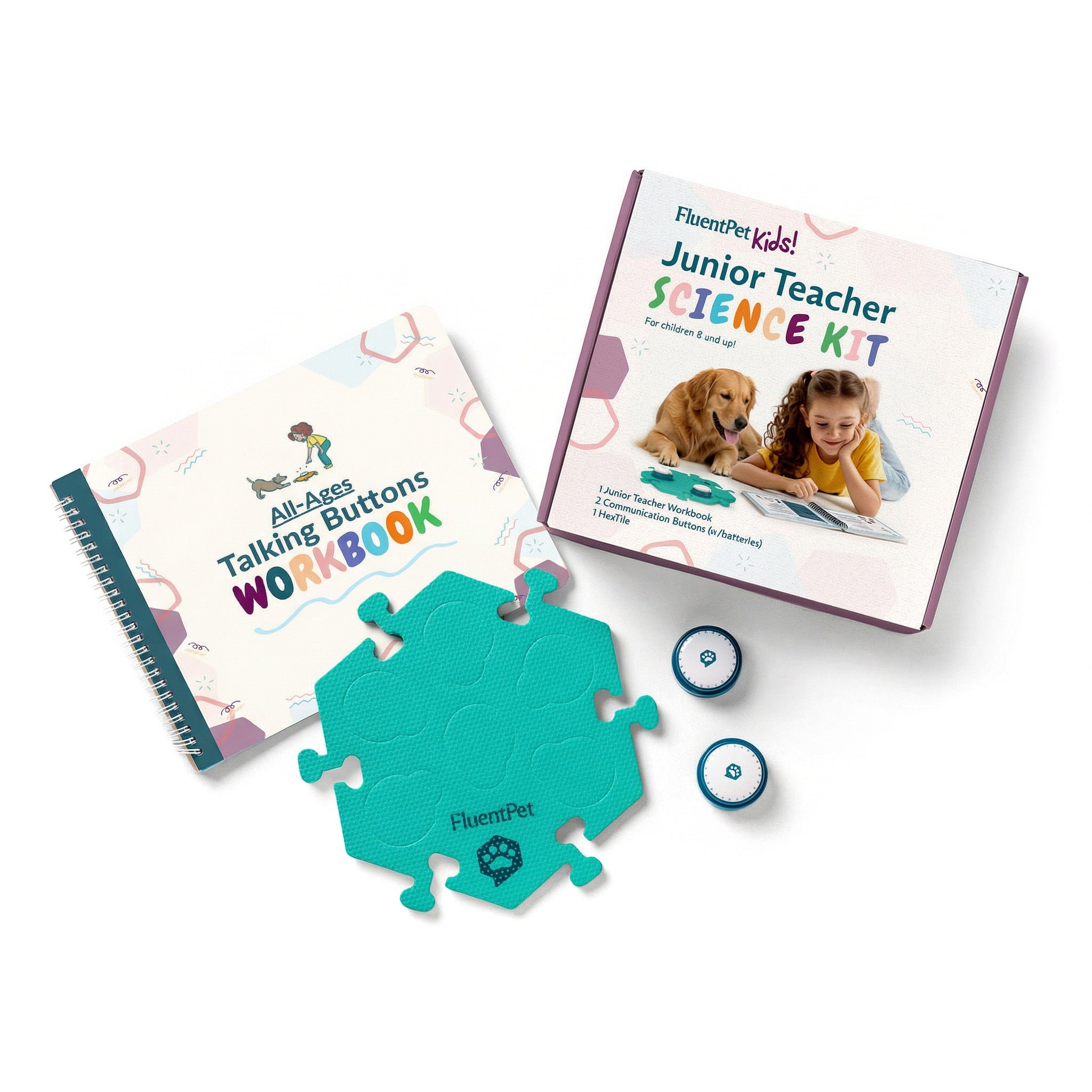 The FluentPet Junior Teacher Science Kit featuring a box, a green HexTile, two Speak Up! recordable buttons and the Junior Teacher Workbook.