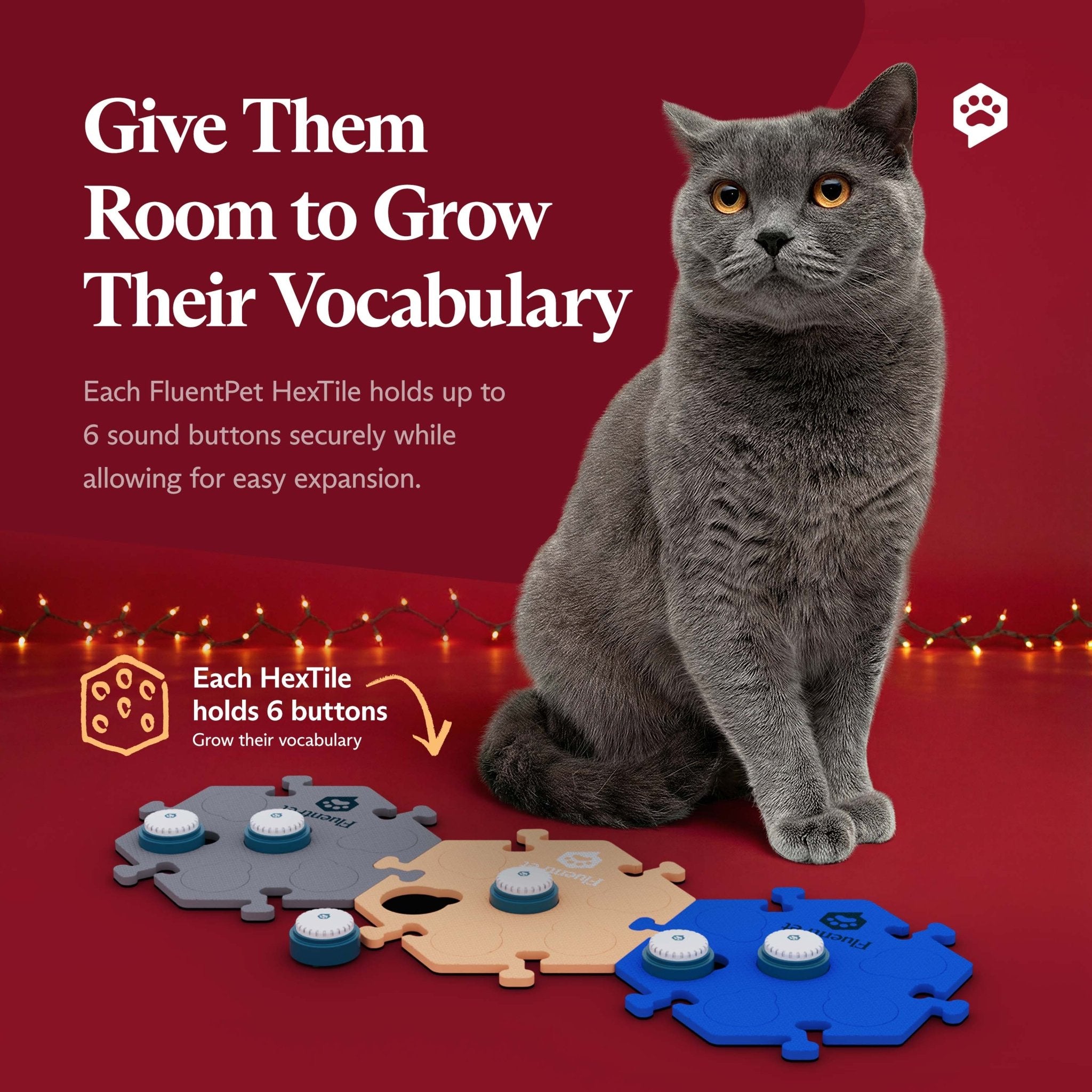 A grey cat poses with FluentPet HexTiles and sound buttons, highlighting pet communication for a holiday or Black Friday promo.